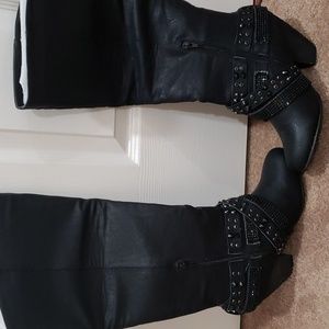 Jessica Simpson black leather detailed knee length boots. Size 8.5. Gently worn.